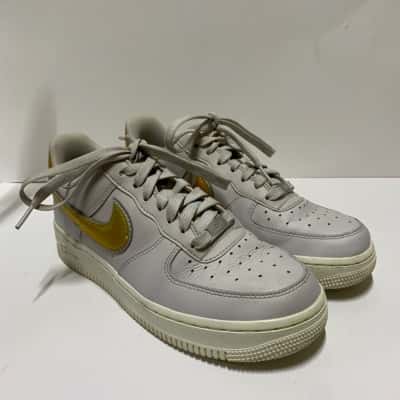 nike air force 1 07 grey gold
