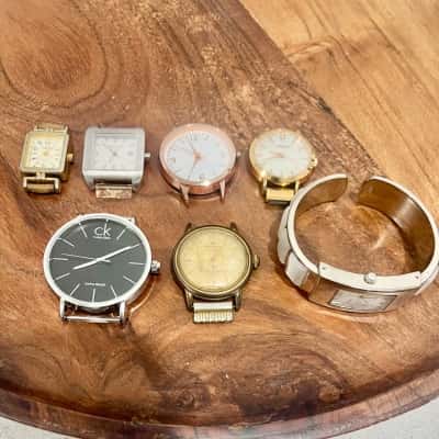 6 watch Faces & 1 cuff Watch without back.