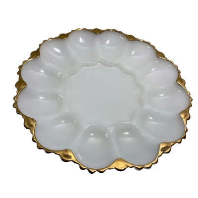 vintage Anchor Hocking Fire-King milk glass deviled egg plate features a brilliant white opaque finish accented with a scalloped 22K gold-trimmed rim.