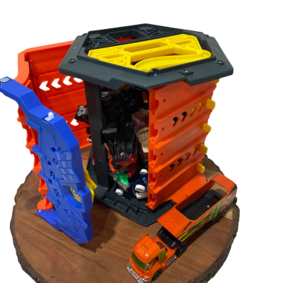 A Mystery Bundle of Hot Wheels cars with a Hot Wheel Track case. 