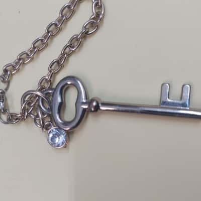 Gold Tone Bracelet with Key