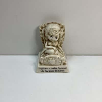 Finding happiness figurine