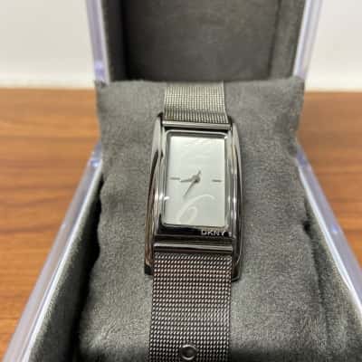***UNTESTED*** DKNY silver toned watch with stainless steel mesh band 