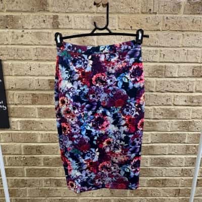 Tokito Womens purple floral skirt Size 6 