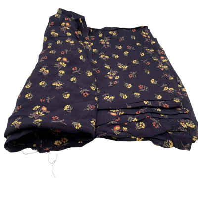 Synthetic fibre.  Black with flowers.  295 (w) x 100 (L) cm.