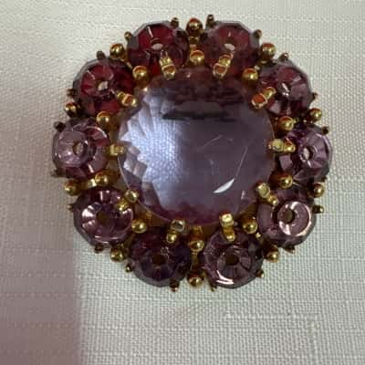  Women's Vintage Gold Tone Brooch featuring a Large Central Faceted Purple Stone 