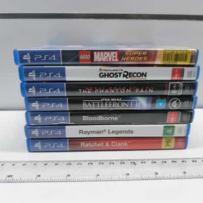 Sony PS4 Games Bundle Lot of 7 Bloodborne Metal Gear Solid V Rayman Ratchet
