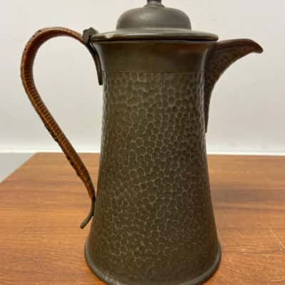 Pewter coffee pot with wicker / woven cane wrapping on the handle