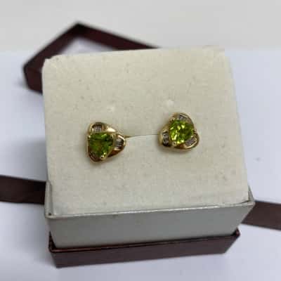 375 9K Gold Trillion Cut Peridot + Baguette Diamond Earrings  