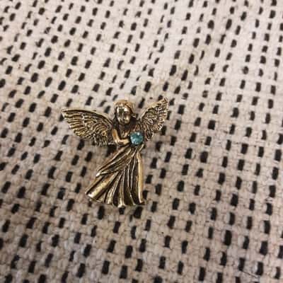 Vintage Gold Tone angel pin with aged patina 