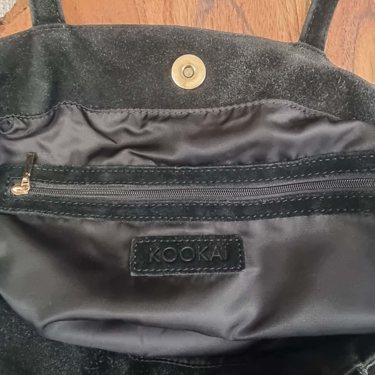black and snake print bag