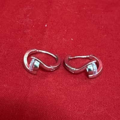  Women's Silver Tone Huggie Hoop Earrings featuring a Small Clear Stone