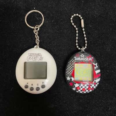 Lot of 2 Tamagotchi & Virtual Pets UNTESTED PARTS OR REPAIR ONLY
