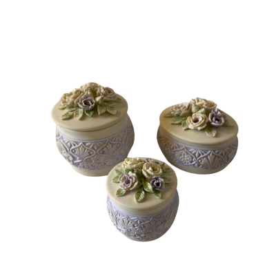 Handcast brand trio of trinket boxes