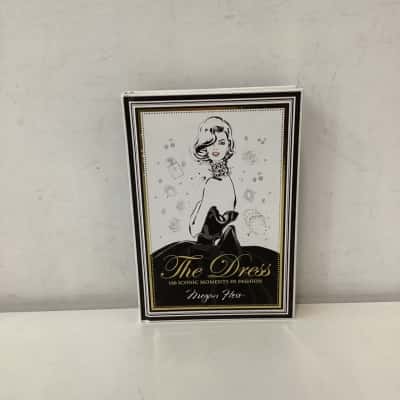 The Dress: 100 Iconic Moments in Fashion hardcover book