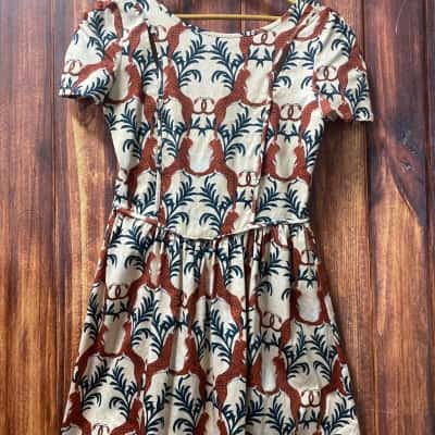 Three of Something  Size 8 Beige / Brown  jaguar dress 