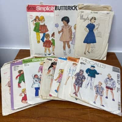 Collection of 21 vintage children’s dress making patterns