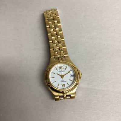 Pulsar Quartz 50 meter Water Resistant Gold Band Watch