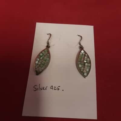 Marquise shaped dangle earrings featuring a green and white mosaic tile design in Stirling silver