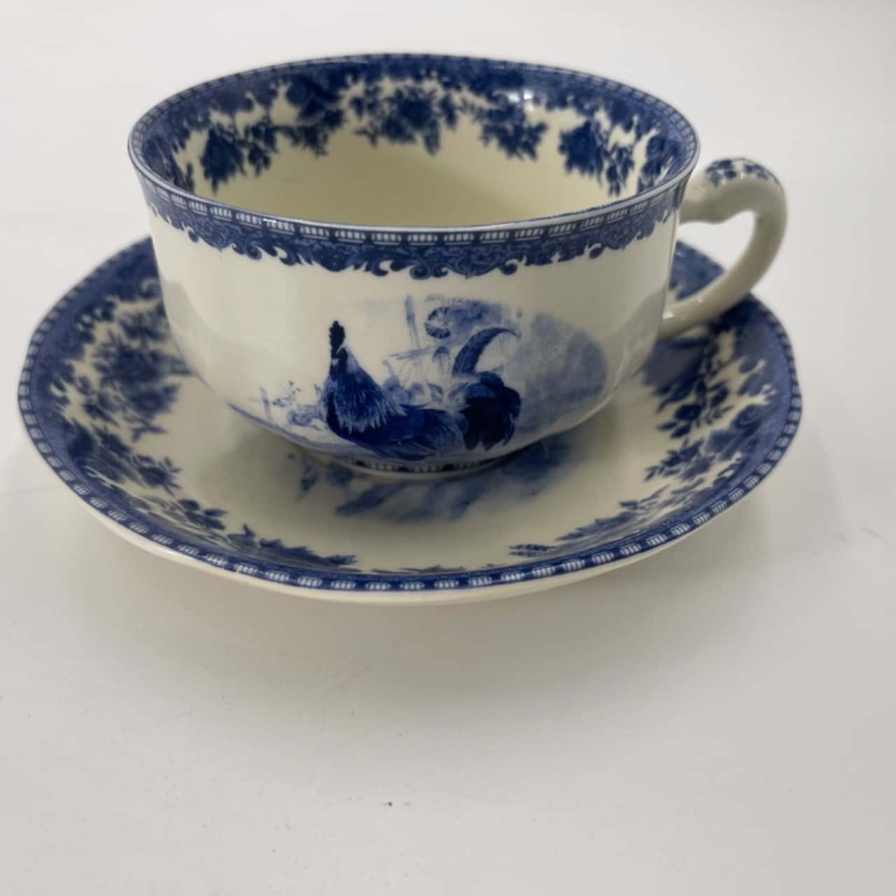 Robert Gordon pottery Farm Yard Blue and White Teacup and saucer set(s)