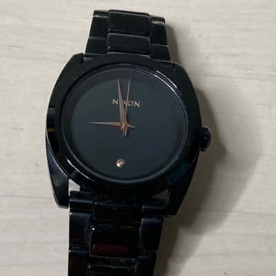 Nixon Black Casing Gold Tone Hands Men's Watch