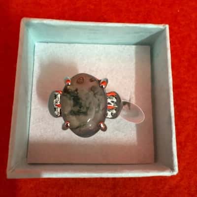  Women's  Silver Tone Ring Featuring a Grey/Greenish Stone