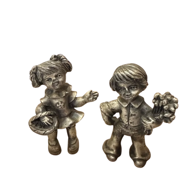 vintage pair of boy-and-girl decorative figurines 