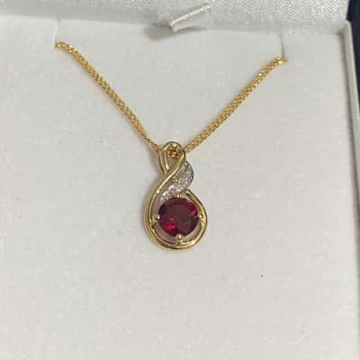 Prouds 9ct Pendant created Ruby and diamond