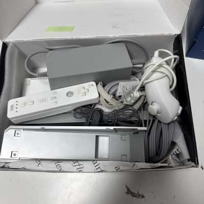Wii console with remote and nunchuck working 