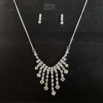 Necklace and Earrings Rhinestones in Silver Tones. 