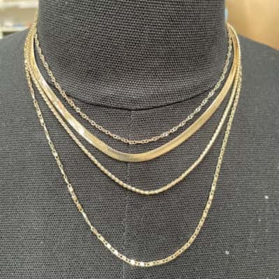 Four Strand Necklace in Gold Tones