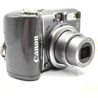 Canon PowerShot A590 IS 8.0MP Digital Camera With Original Carry Pouch - Turns On & All Appears to Work Fine. Condition is A1.