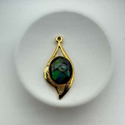 Opal Shards Set In Resin Golden Tone Pendant