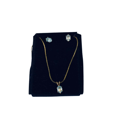  Womens gold tone necklace and earring set with light blue oval cut gemstones