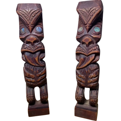 Wooden Māori carved tiki statues