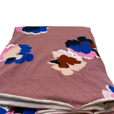 Stretch cotton mix (t-shirt type material). Approx. 150 x 110 cm  Floral pattern.