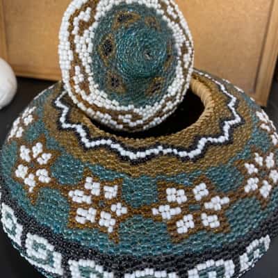 Handmade sea grass beaded basket with a lid 