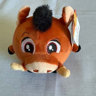 Disney The Lion King Pumbaa Squeezamal plush toy.  It is a round, squishy soft toy made of a super-squishy material. The character is Pumbaa from Disney's "The Lion King" movie.(B14)