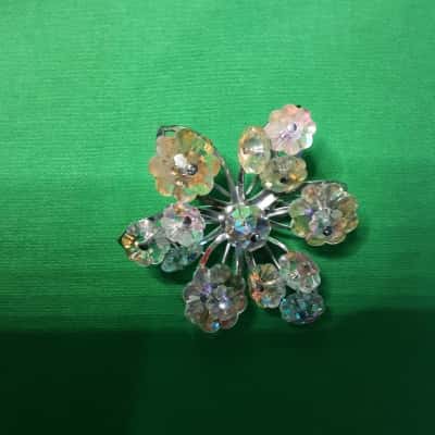 Vintage aurora borealis Crystal flower brooch featuring faceted iridescent glass beads