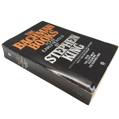 Highly Collectable Paperback Book -  The Bachman Books Four Early Novels By Stephen King:  Rage, The Long Walk, Roadwork, The Running Man. Book Is In Good Overall Condition With Some Minor Creasing On the Cover - See Pics