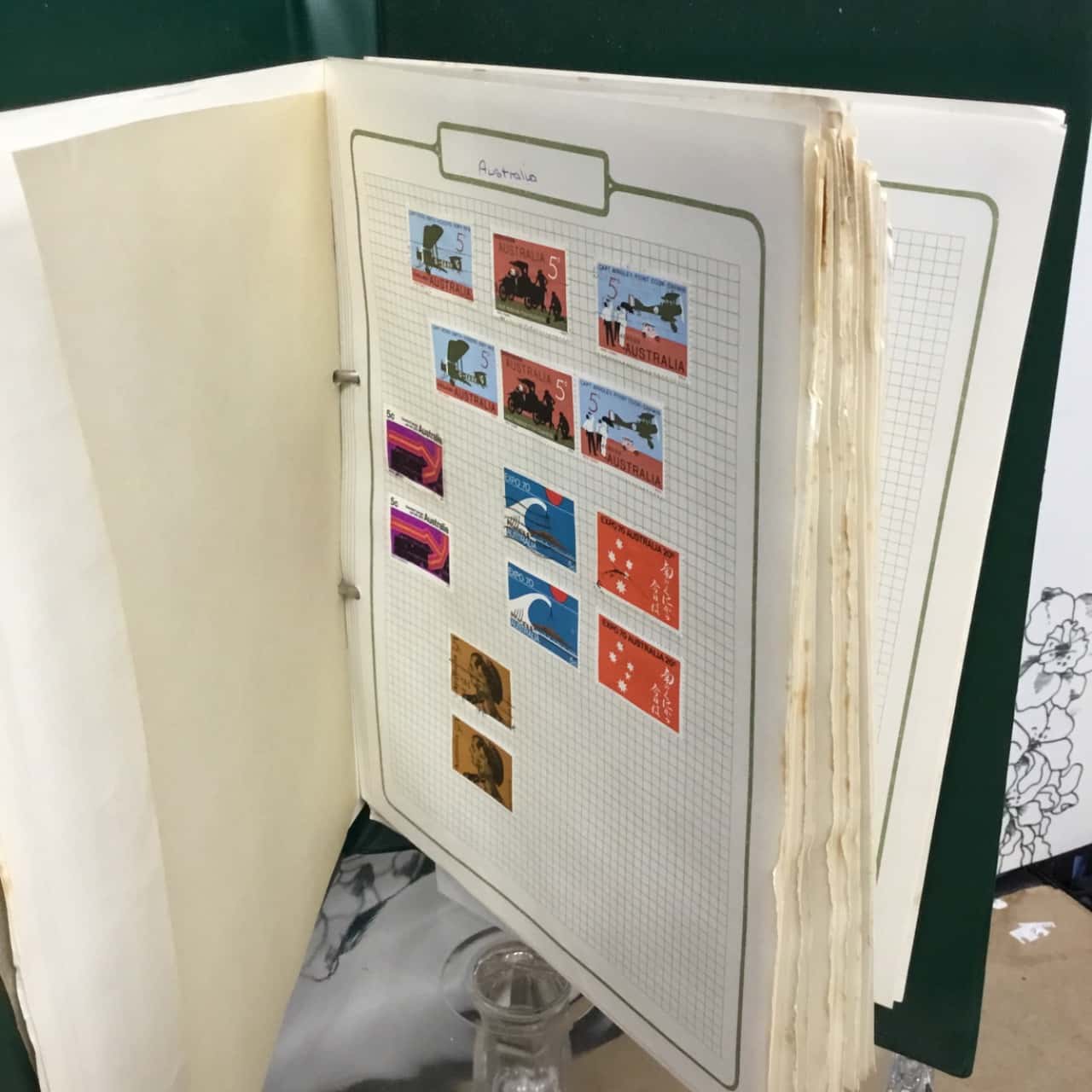 stamp collection in green binder (s)