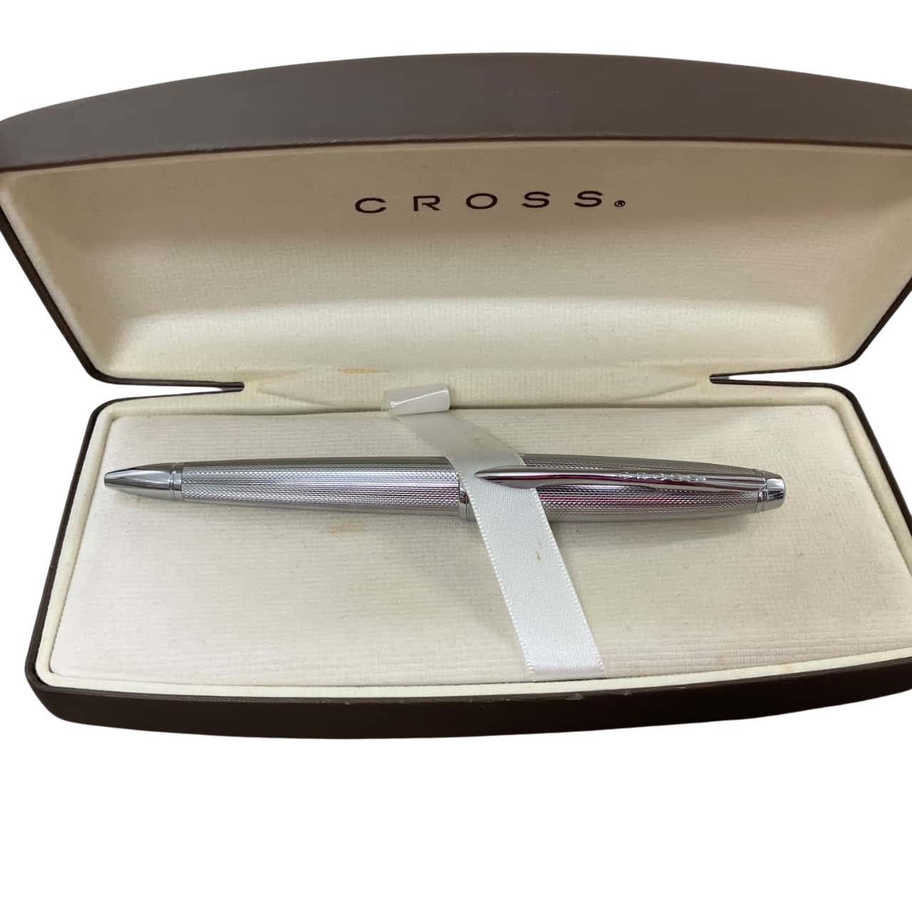 Sleek CROSS pen, chrome body, black ink ballpoint(s)