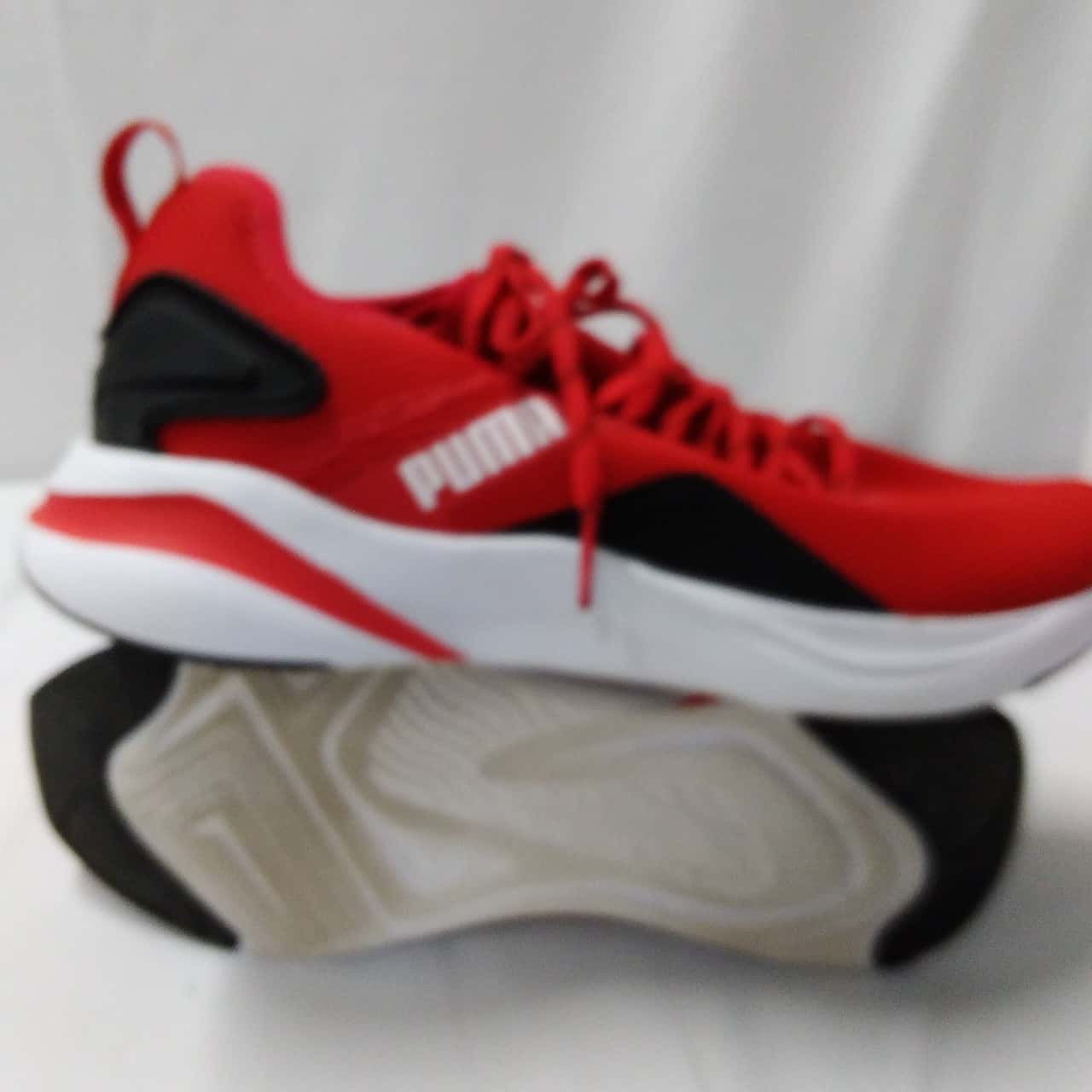 puma black red shoes