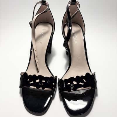 Basque Size 38 (7.5) “Trina” Black Patent Heels featuring a decorative floral cutout band 