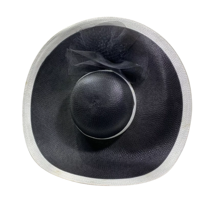 black and white straw wide-brimmed sun hat featuring a contrasting black bow and netting detail