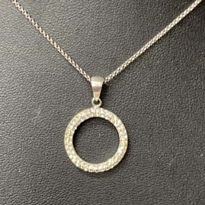  Sterling silver chain and circle of life pendant 