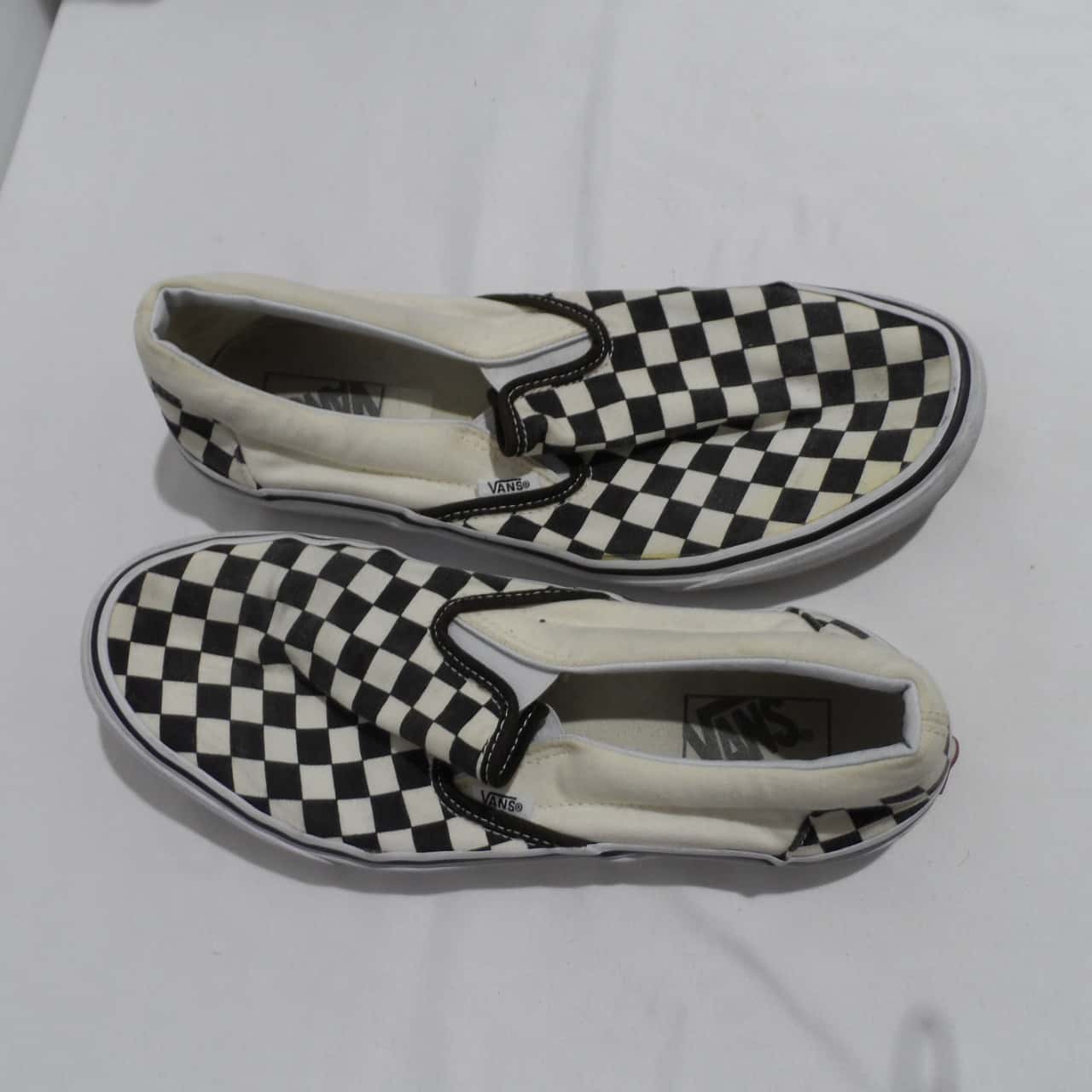 checkerboard slip on vans mens