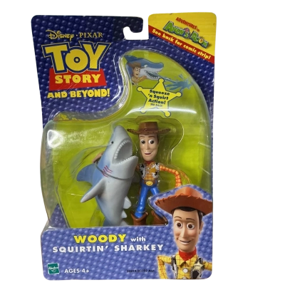 Sealed vintage Toy Story and beyond woody and squirtin’ sharkey figurine 