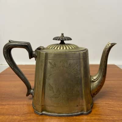 Pretty teapot stamped “EPNS with hardened metal” 