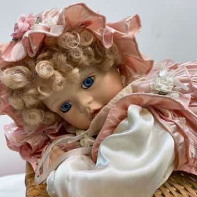 Porcelain Doll Laying Down 